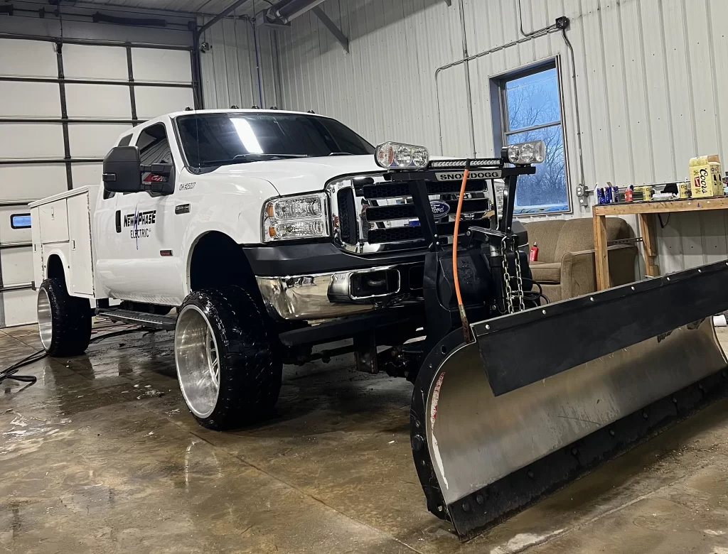 Clean commercial fleet trucks after mobile detailing service